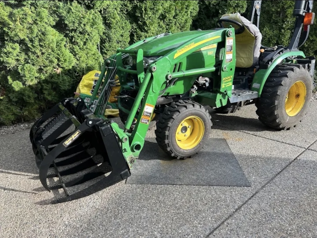 Root Grapple on JD compact tractor