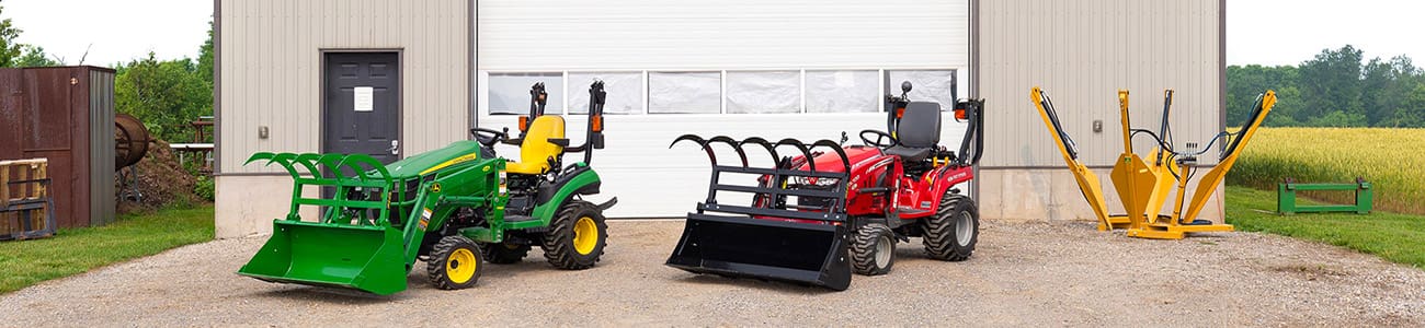 Subcompact tractors with grapples