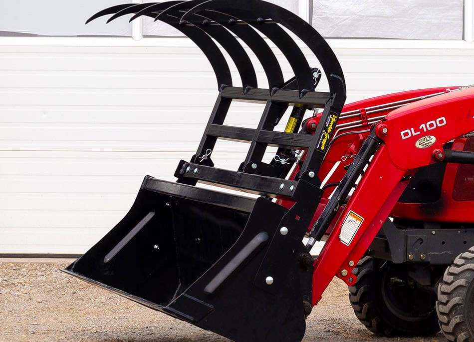 compact tractor with hydraulic add on grapple